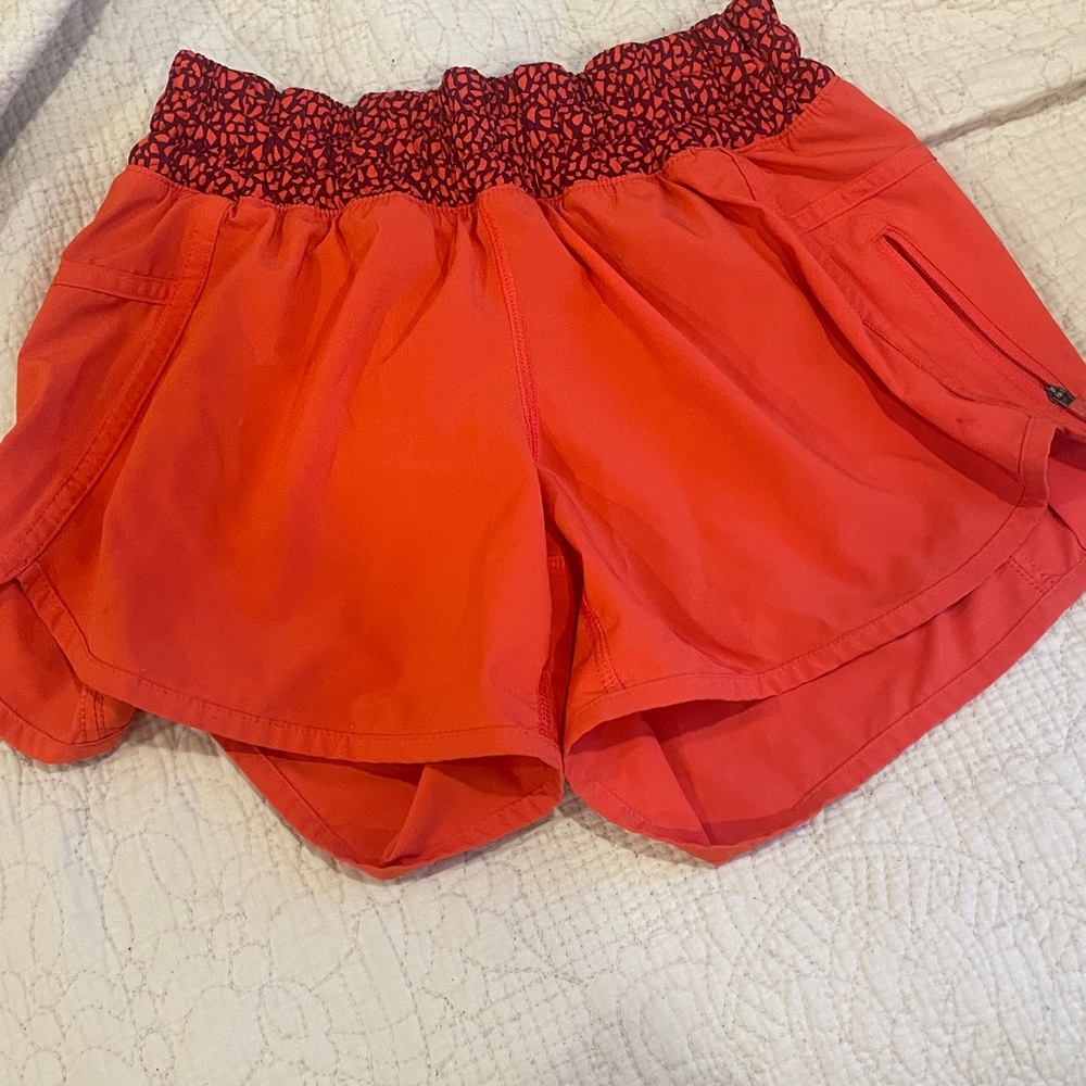 Red Lululemon shorts with Patterned Waistband SIZE 2  great condition!